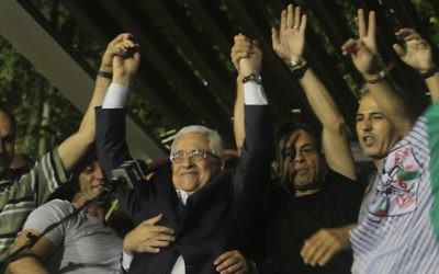 Mahmoud Abbas celebrating the return of Palestinian prisoners in August 2013 (photo credit:  Issam Rimawi/Flash90)