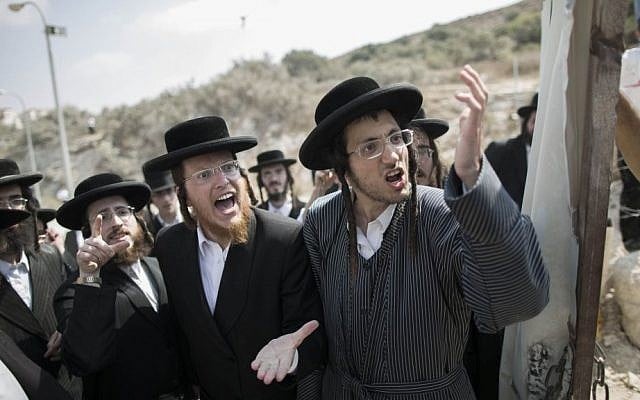 Ultra-Orthodox Jewish men during a demonstration in Beit Shemesh on August 13, 2013. (photo credit: Yonatan Sindel/Flash90) Ultra-Orthodox Jewish men during a demonstration in Beit Shemesh on August 13, 2013. (photo credit: Yonatan Sindel/Flash90)
