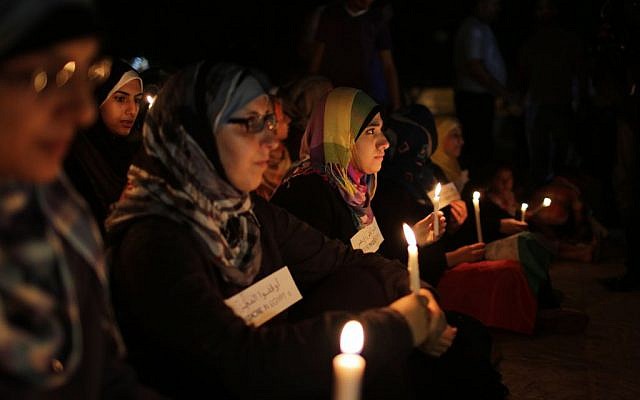 Women in Gaza hold candles during a solidarity protest with Egyptian casualties, August 16, 2013 (photo credit: Flash90/Wissam Nassar) Women in Gaza hold candles during a solidarity protest with Egyptian casualties, August 16, 2013 (photo credit: Flash90/Wissam Nassar)