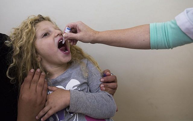 A child being vaccinated in Jerusalem Monday. (photo credit: Yonatan Sindel/Flash90) A child being vaccinated in Jerusalem Monday. (photo credit: Yonatan Sindel/Flash90)
