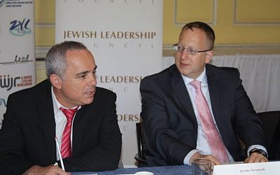 Yuval Steinitz (left), Israel's minister for intelligence and strategic affairs, meets with the Jewish Leadership Council during a visit to England. Courtesy of the Jewish Leadership Council) 