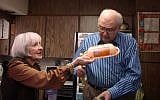 Lee and Morty Kaufman examine a Swiffer duster extender. (photo credit: Courtesy Swiffer)