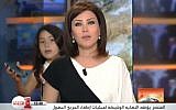 Lena Alwash of Morocco's Medi 1 television channel and her daughter, on live TV (photo credit: YouTube screen cap)