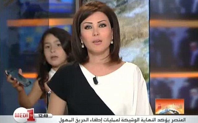 Lena Alwash of Morocco's Medi 1 television channel and her daughter, on live TV (photo credit: YouTube screen cap) Lena Alwash of Morocco's Medi 1 television channel and her daughter, on live TV (photo credit: YouTube screen cap)