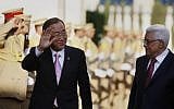 Palestinian President Mahmoud Abbas (right), welcomes UN Secretary-General Ban Ki-moon upon his arrival in Ramallah on August 15 , 2013. (photo credit: AP/Majdi Mohammed)