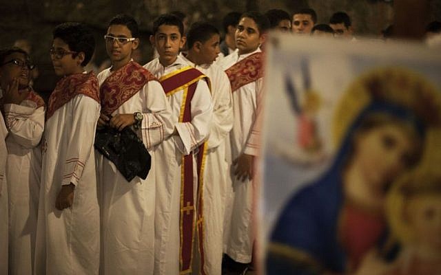 Egyptian youths line up before a procession at Al-Mahraq monastery in Assiut, Upper Egypt, Tuesday, Aug. 6, 2013. (Photo credit: AP/Manu Brabo) Egyptian youths line up before a procession at Al-Mahraq monastery in Assiut, Upper Egypt, Tuesday, Aug. 6, 2013. (Photo credit: AP/Manu Brabo)