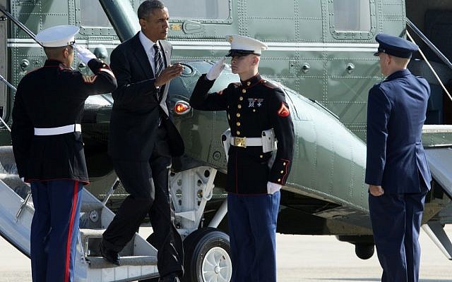 Illustrative photo of President Barack Obama as he is met by the 11th Wing and Joint Base Andrews Commander Col. William Knight, as he switched from the Marine One helicopter to Air Force One at Andrews Air Force Base, Md., on Thursday, August 22, 2013. (photo credit: AP/Manuel Balce Ceneta) Illustrative photo of President Barack Obama as he is met by the 11th Wing and Joint Base Andrews Commander Col. William Knight, as he switched from the Marine One helicopter to Air Force One at Andrews Air Force Base, Md., on Thursday, August 22, 2013. (photo credit: AP/Manuel Balce Ceneta)