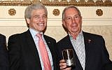 William Rapfogel, left, then the head of the Metropolitan Council on Jewish Poverty, and New York Mayor Michael Bloomberg attend the social service agency's annual legislative breakfast in 2008. (photo credit: Metropolitan Council via JTA)