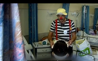 An Arabic-speaking Israeli clown visits Syrian patients being treated in an Israeli hospital (photo credit: Channel 10 screenshot)