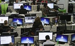 Al-Jazeera America newsroom in New York (photo credit: AP/Bebeto Matthews/File)