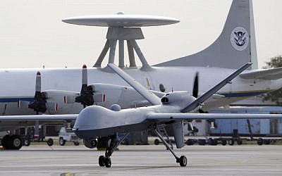 A Predator B unmanned aircraft taxis at the Naval Air Station in Corpus Christi, Texas. (photo credit: AP/Eric Gay)