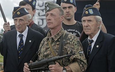 SS Galician Division veterans, left and right foreground, near the village of Yaseniv in western Ukraine on Sunday, July 21, 2013. (photo credit:AP/Efrem Lukatsky)