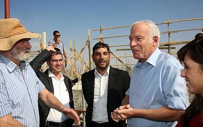 Housing Minister Uri Ariel (second from right) and Deputy Transportation Minister Tzipi Hotovely (right) during visit to the settlement of Kochav Yaakov in August 2013 (photo credit: Sasson Tiram/ Ministry of Housing and Construction) Then housing minister Uri Ariel (second from right) and then deputy transportation minister Tzipi Hotovely (right) during visit to the settlement of Kochav Yaakov in August 2013 (photo credit: Sasson Tiram/ Ministry of Housing and Construction)