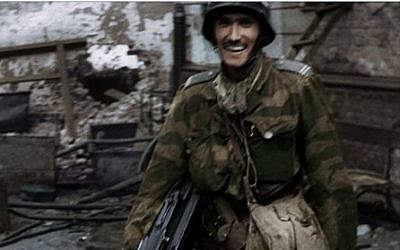 Frame grab made available by the Warsaw Rising Museum shows Witold Kiesun taken from snippets of historical footage from the 1944 Warsaw Uprising, enhanced by modern coloring and sound techniques (AP/Warsaw Rising Museum)