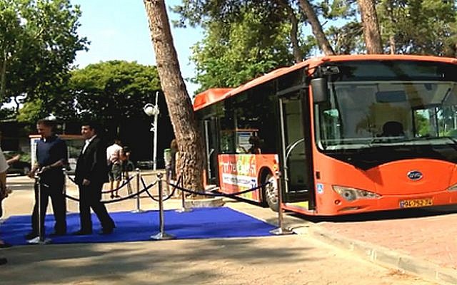 Dan's electric bus is displayed in Tel Aviv, Monday (photo credit: Screen shot, Globes)