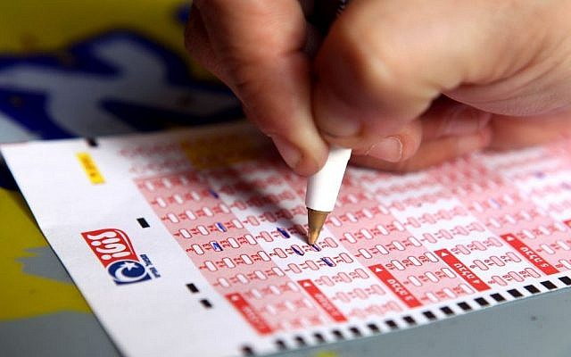 Illustrative: A lotto card from Israel's Mifal Hapayis national lottery. (Flash90/Abir Sultan)
