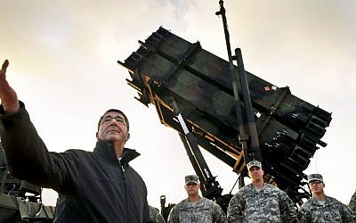 Former US Deputy Defense Secretary Ashton B. Carter with troops next to a Patriot anti-missile battery on the Turkish-Syrian border in February, 2013. (photo credit:  Glenn Fawcett/ US Department of Defense)