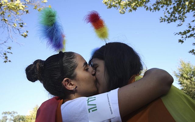 A couple at the annual gay parade in Jerusalem on August 01, 2013 (photo credit: Nati Shohat/Flash90) A couple at the annual gay parade in Jerusalem on August 01, 2013 (photo credit: Nati Shohat/Flash90)