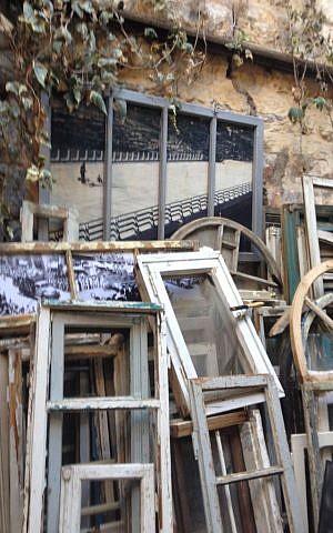 Looking at the city through artist Yoram Amir's window frames (photo credit: Jessica Steinberg/Times of Israel) Looking at the city through artist Yoram Amir's window frames (photo credit: Jessica Steinberg/Times of Israel)