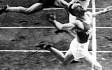 Finish-line shot of the 1938 100-meter race at Helsinki Olympic Stadium (photo credit: public domain, via Wikipedia)