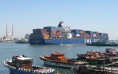 A container ship passing through the Suez Canal. (photo credit: CC BY Argenberg, Flickr)