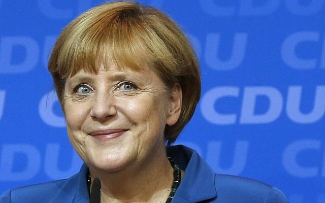 A victorious German Chancellor Angela Merkel smiles as she addresses supporters at the party headquarters in Berlin, Germany, Sunday, Sept. 22, 2013. (photo credit: AP Photo/Michael Sohn) A victorious German Chancellor Angela Merkel smiles as she addresses supporters at the party headquarters in Berlin, Germany, Sunday, Sept. 22, 2013. (photo credit: AP Photo/Michael Sohn)