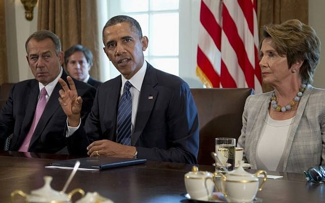 President Barack Obama, flanked by House Speaker John Boehner of Ohio, left, and House Minority Leader Nancy Pelosi of California, speaks to media in the Cabinet Room of the White House in Washington, Tuesday, September 3, 2013 (photo credit: AP/Carolyn Kaster) President Barack Obama, flanked by House Speaker John Boehner of Ohio, left, and House Minority Leader Nancy Pelosi of California, speaks to media in the Cabinet Room of the White House in Washington, Tuesday, September 3, 2013 (photo credit: AP/Carolyn Kaster)