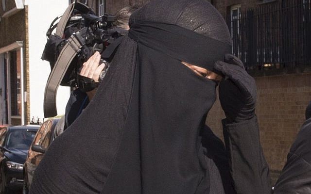 A Muslim woman, who cannot be named for legal reasons, arrives at a London court, where a judge has ruled that she will be allowed to stand trial while wearing a full-face veil, but that she must remove it when giving evidence. (photo credit: AP/Stefan Rousseau) A Muslim woman, who cannot be named for legal reasons, arrives at a London court, where a judge has ruled that she will be allowed to stand trial while wearing a full-face veil, but that she must remove it when giving evidence. (photo credit: AP/Stefan Rousseau)