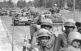 Israeli troops rushing up to the northern frontier with the outbreak of the Yom Kippur War, October 7, 1973. (GPO/Eitan Harris)