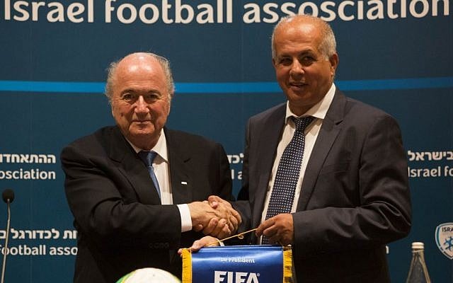 FIFA President Sepp Blatter (left) with former Israel Football Association chairman Avi Luzon during Blatter's visit to Israel in July, 2013. (photo credit: Yonatan Sindel/Flash90) FIFA President Sepp Blatter (left) with former Israel Football Association chairman Avi Luzon during Blatter's visit to Israel in July, 2013. (photo credit: Yonatan Sindel/Flash90)