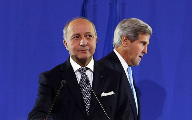 US Secretary of State John Kerry, right, and French Foreign Minister Laurent Fabius arrive for a news conference at the Quai d'Orsay after a foreign ministers meeting to discuss developments in Syria, Paris, Monday, Sept. 16, 2013 (photo credit: AP/Larry Downing, Pool) US Secretary of State John Kerry, right, and French Foreign Minister Laurent Fabius arrive for a news conference at the Quai d'Orsay after a foreign ministers meeting to discuss developments in Syria, Paris, Monday, Sept. 16, 2013 (photo credit: AP/Larry Downing, Pool)