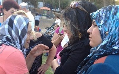 Jewish Kurdish women from Israel and Muslim Kurdish women from Iraq converse in Sorani Kurdish after meeting each other at the 2013 Saharane festival in Jerusalem (photo credit: Times of Israel/Lazar Berman) Jewish Kurdish women from Israel and Muslim Kurdish women from Iraq converse in Sorani Kurdish after meeting each other at the 2013 Saharane festival in Jerusalem (photo credit: Times of Israel/ Lazar Berman)