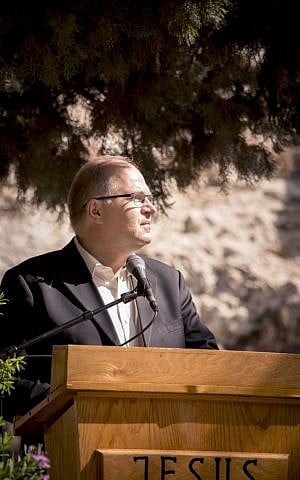 Jürgen Bühler speaks at the Garden Tomb in Jerusalem, this week (Courtesy of the International Christian Embassy Jerusalem)