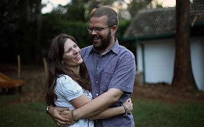 Katherine Walton, 38, from the United States, poses for a photograph with her husband Philip during an interview with the Associated Press in Nairobi, Kenya, Friday Sept. 27, 2013. (photo credit: AP Photo/Jerome Delay)