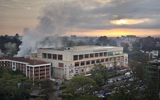 Dawn breaks over the still-smoldering Westgate Mall in Nairobi, Kenya, Thursday, Sept. 26, 2013. (photo credit: AP/Ben Curtis) Dawn breaks over the still-smoldering Westgate Mall in Nairobi, Kenya, Thursday, Sept. 26, 2013. (photo credit: AP/Ben Curtis)