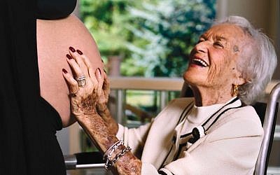 Photographer Gillian Laub used her 'Grandma Feeling My Belly' as her interpretation of Va-Ye'lekh, the Torah portion in which Moses informs Israel that at the age of 120 he is no longer able to lead them in to the Land of Israel. (photo credit: Courtesy of Gillian Laub)