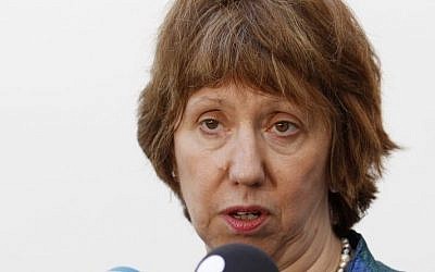 European foreign policy chief Catherine Ashton talks with journalists as she arrives for an informal meeting of EU Ministers for Foreign Affairs at the National Museum – Palace of the Grand Dukes of Lithuania in Vilnius, Lithuania, Friday, Sept. 6, 2013. (AP Photo/Mindaugas Kulbis)