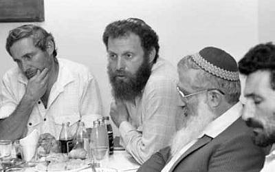 Meeting of Gush Emunim settlement leaders, July 1987. Hanan Porat is at far left, with Yoel Bin-Nun next to him. (Shmuel Rabmani) Meeting of Gush Emunim settlement leaders, July 1987. Hanan Porat is at far left, with Yoel Bin-Nun next to him. (Shmuel Rabmani)