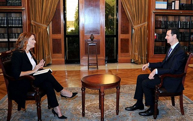 President Bashar Assad being interviewed by Italy's RAI News 24 TV, at the presidential palace in Damascus, Syria, on Sunday, September 29, 2013. (photo credit: AP/SANA) President Bashar Assad being interviewed by Italy's RAI News 24 TV, at the presidential palace in Damascus, Syria, on Sunday, September 29, 2013. (photo credit: AP/SANA)