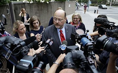 Republican mayoral hopeful Joe Lhota talks with reporters as he arrives to his polling station during the primary election in New York, Tuesday, Sept. 10, 2013. (photo credit: AP Photo/Seth Wenig) Republican mayoral hopeful Joe Lhota talks with reporters as he arrives to his polling station during the primary election in New York, Tuesday, Sept. 10, 2013. (photo credit: AP Photo/Seth Wenig)
