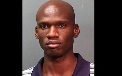 This booking photo provided by the Fort Worth Police Department shows Aaron Alexis, arrested in September, 2010, on suspicion of discharging a firearm in the city limits. The FBI has identified Alexis, 34, as the gunman in the Monday, Sept. 16, 2013 shooting rampage at at the Washington Navy Yard in Washington that left thirteen dead, including himself. (AP/ Fort Worth Police Department)