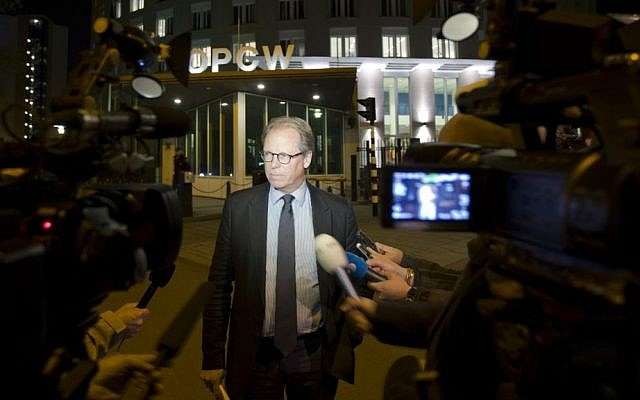 Spokesman Michael Luhan gives a brief statement outside the headquarters of the Organization for the Prohibition of Chemical Weapons, OPCW, in The Hague, Netherlands, Friday Sept. 27, 2013. (photo credit: AP Photo/Peter Dejong) Spokesman Michael Luhan gives a brief statement outside the headquarters of the Organization for the Prohibition of Chemical Weapons, OPCW, in The Hague, Netherlands, Friday Sept. 27, 2013. (photo credit: AP Photo/Peter Dejong)