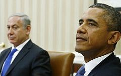 US President Barack Obama (right) and Prime Minister Benjamin Netanyahu (left) prepare for a press session in the White House in Washington, DC, September 30, 2013. (AP/Charles Dharapak)