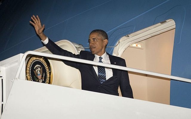 US President Barack Obama waves as he boards Air Force One before his departure on Tuesday to Sweden and Russia (photo credit: AP/Pablo Martinez Monsivais) US President Barack Obama waves as he boards Air Force One before his departure on Tuesday to Sweden and Russia (photo credit: AP/Pablo Martinez Monsivais)