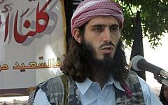 In this Wednesday, May 11, 2011 file photo, American-born Islamist militant Omar Hammami addresses a press conference of the militant group al-Shabab at a farm in southern Mogadishu's Afgoye district in Somalia. (photo credit: AP Photo/Farah Abdi Warsameh, File)