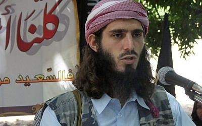 In this Wednesday, May 11, 2011 file photo, American-born Islamist militant Omar Hammami addresses a press conference of the militant group al-Shabab at a farm in southern Mogadishu's Afgoye district in Somalia. (photo credit: AP Photo/Farah Abdi Warsameh, File)