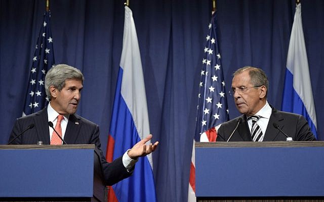 U.S. Secretary of State John Kerry, left, and Russian Foreign Minister Sergei Lavrov, right, deliver statements in Geneva, Switzerland, Saturday Sept. 14, 2013. (photo credit: AP Photo/Keystone,Martial Trezzini) U.S. Secretary of State John Kerry, left, and Russian Foreign Minister Sergei Lavrov, right, deliver statements in Geneva, Switzerland, Saturday Sept. 14, 2013. (photo credit: AP Photo/Keystone,Martial Trezzini)