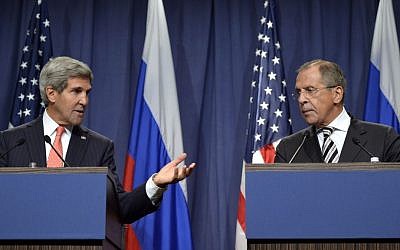 US Secretary of State John Kerry, left, and Russian Foreign Minister Sergey Lavrov, deliver statements on the situation in Syria, from Geneva, Switzerland, Sept. 14, 2013 (photo credit: AP/Keystone/Martial Trezzini)