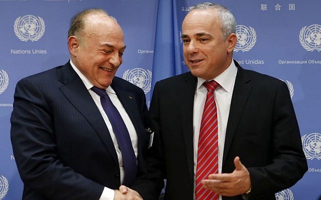 File: Palestinian Finance Minister Shukri Bishara, left, shakes hands with Israeli Intelligence Minister Yuval Steinitz after a press conference regarding a meeting of the Ad Hoc Liaison Committee during the 68th session of the United Nations General Assembly at UN headquarters, Wednesday, Sept. 25, 2013. (photo credit: AP Photo/Jason DeCrow) File: Palestinian Finance Minister Shukri Bishara, left, shakes hands with Israeli Intelligence Minister Yuval Steinitz after a press conference regarding a meeting of the Ad Hoc Liaison Committee during the 68th session of the United Nations General Assembly at UN headquarters, Wednesday, Sept. 25, 2013. (photo credit: AP Photo/Jason DeCrow)