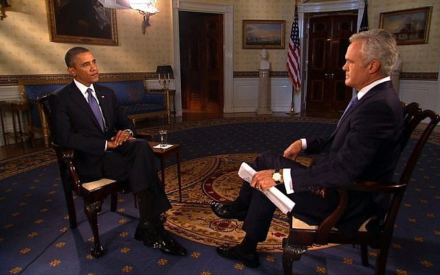 CBS news anchor Scott Pelley, right, interviews US President Barack Obama in the Blue Room of the White House in Washington, on Monday (photo credit: AP/CBS News) CBS news anchor Scott Pelley, right, interviews US President Barack Obama in the Blue Room of the White House in Washington, on Monday (photo credit: AP/CBS News)